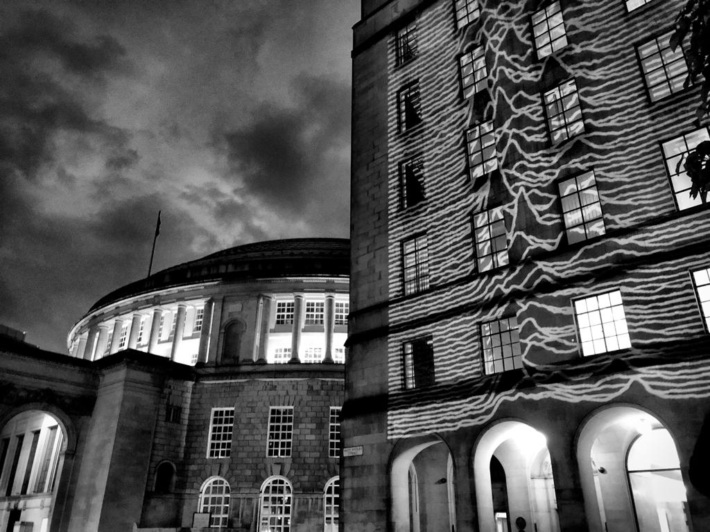 Joy Division's 'Unknown Pleasures' Beamed On To Manchester Landmarks